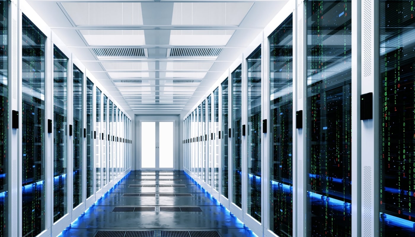 Data center with racks of servers and modern data center lighting.